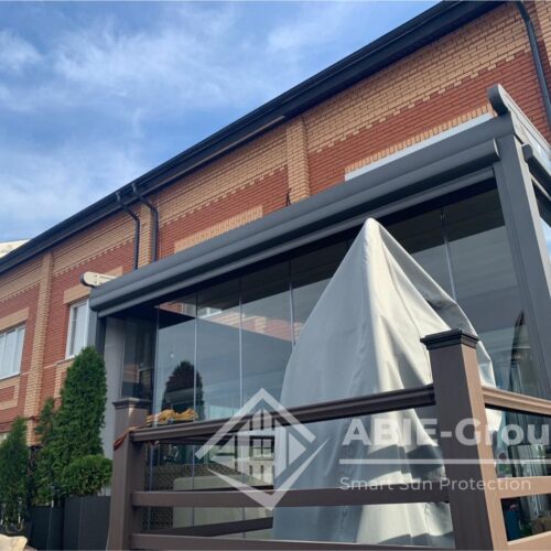 Фотографии выполненных работ компании «ABIE-GROUP» Алюминиевой перголы со сдвижным тентом, безрамным остеклением и zip системами. дер.Румянцево, поселение Московский, Москва
