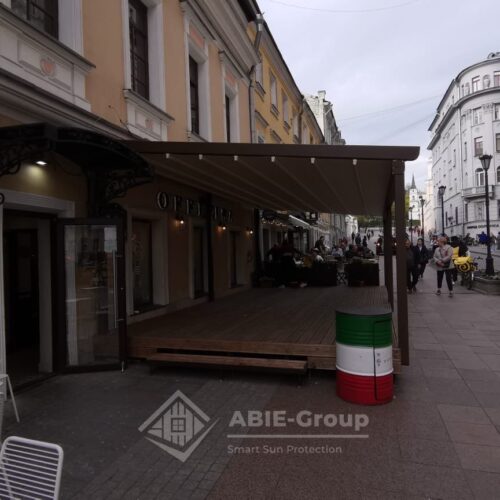 Фотографии выполненных работ компании «ABIE-GROUP» Алюминиевой перголы со сдвижным тентом для итальянского ресторана. г.Москва
